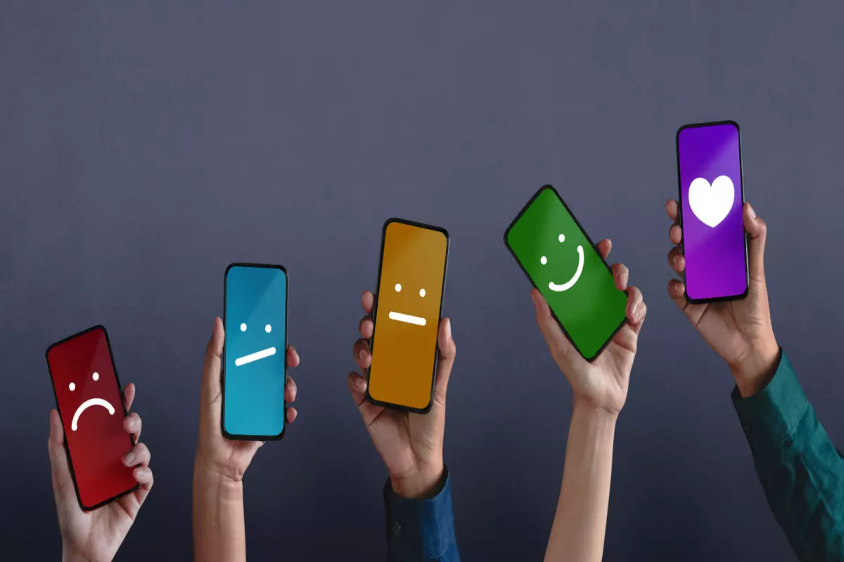 5 iPhone screens showing customer feedback emotions. 